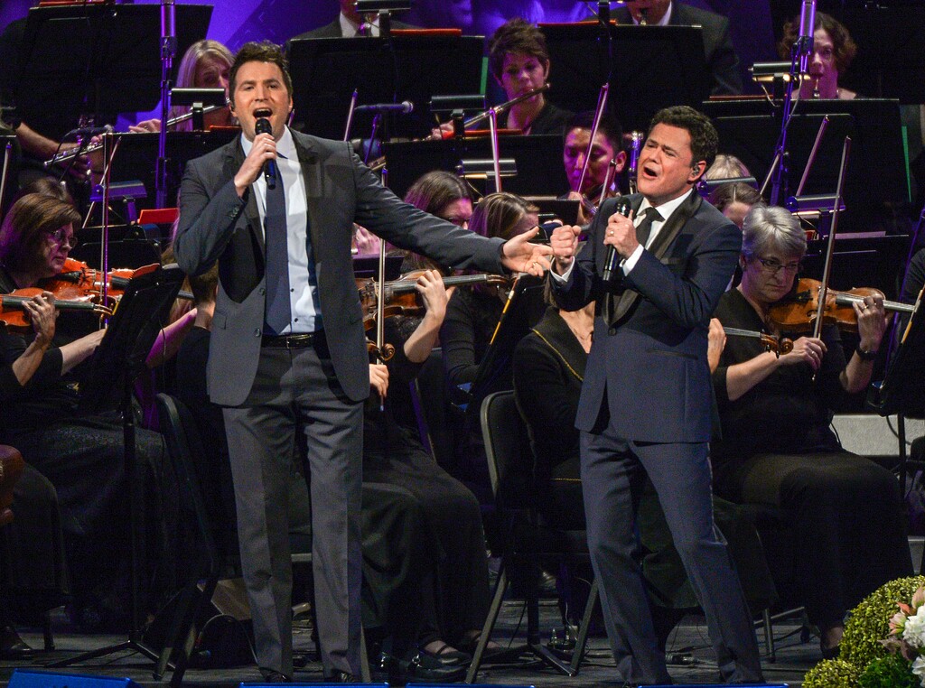 (Leah Hogsten | The Salt Lake Tribune) Nathan Pacheco and Donny Osmond sings ÒThe Prayer, from Quest for CamelotÓ during the gala celebrating the 95th birthday of President Russell M. Nelson, Friday, September 6, 2019, at The Church of Jesus Christ of Latter-Day Saints Conference Center in Salt Lake City.