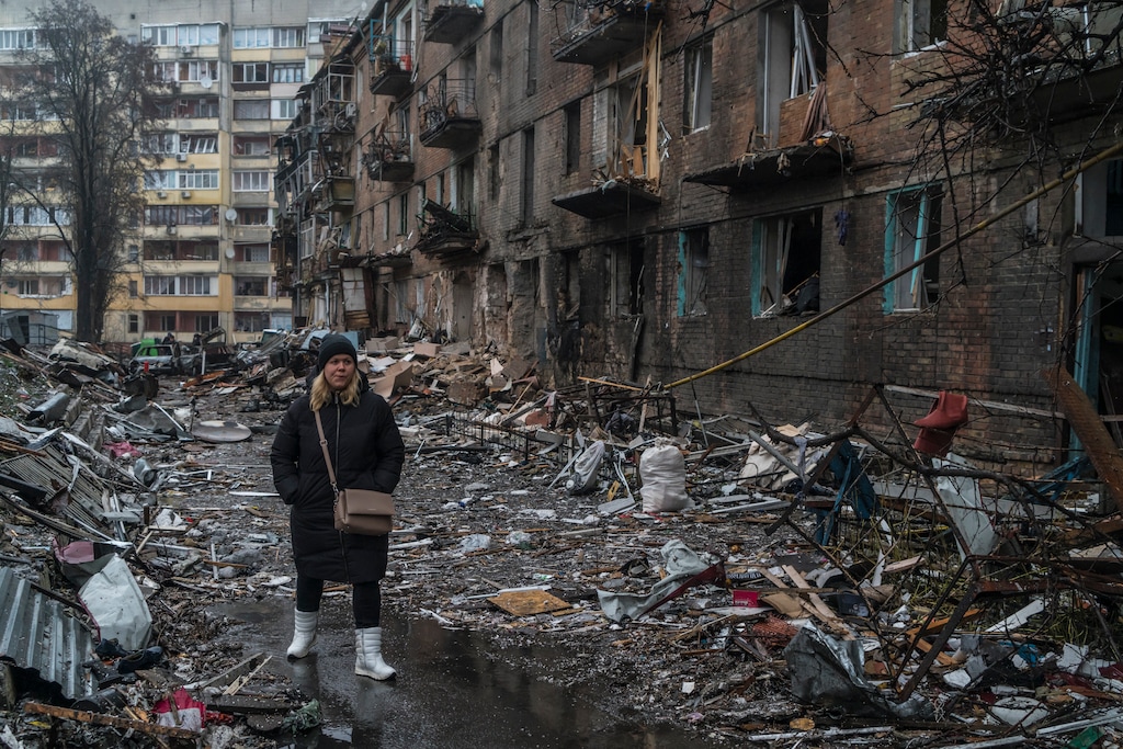 (Brendan Hoffman | The New York Times)

A resident navigates rubble left behind when a Russian missile struck a building the previous day in Vyshhorod, Ukraine on Nov. 24, 2022.