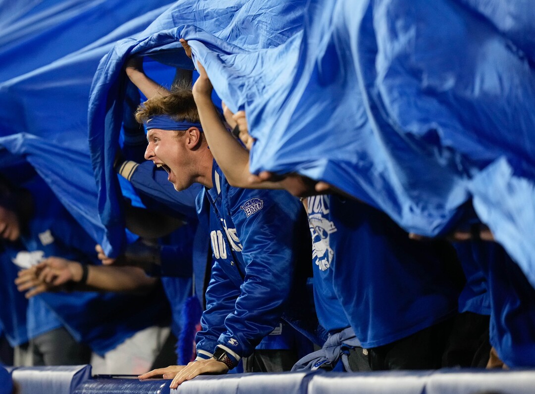 (Francisco Kjolseth | The Salt Lake Tribune) The student section drives up the decibel level during the game between the Brigham Young Cougars and the Wyoming Cowboys at LaVell Edwards Stadium in Provo, on Saturday, Sept. 24, 2022.