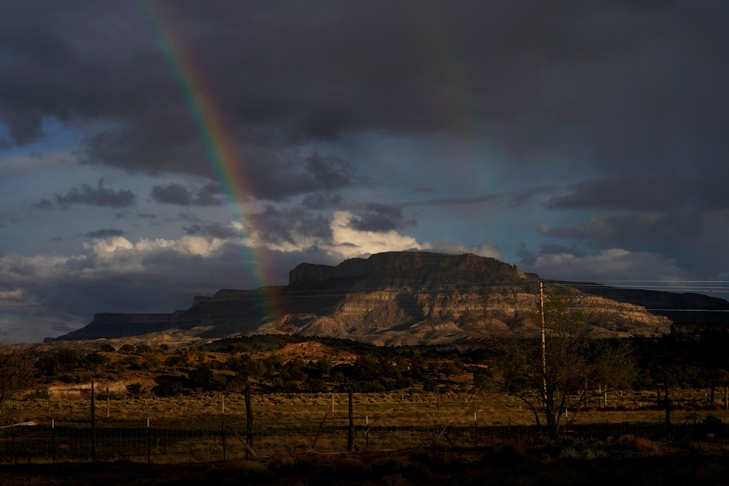 (Carolyn Kaster | AP file photo)

A rainbow is seen in the distance from the closed Chilchinbeto Church of the Nazarene in Chilchinbeto, Ariz., on the Navajo reservation on April 21, 2020. The reservation has some of the highest rates of coronavirus in the country. A state of emergency and government closures for the reservation has been extended until June 7 to try and stop the spread of the virus.