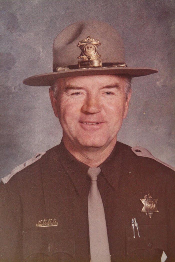 Utah Highway Patrol trooper Robert "Bob" Hayward poses in uniform in this undated photo. In 1975, the then-Utah Highway Patrol sergeant chased a suspicious car and arrested the driver. He turned out to be serial killer Ted Bundy. Hayward died Aug. 5, 2017, at his home in West Valley City. He was 90.  Courtesy Hayward family.