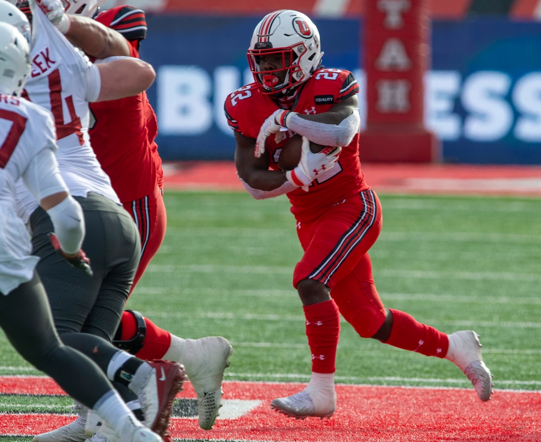 (Rick Egan | The Salt Lake Tribune) Utah Utes running back Ty Jordan (22) runs the ball for Utah, in PAC-12 football acton between Utah Utes and Washington State Cougars at Rice-Eccles Stadium on Saturday, Dec. 19, 2020. . Jordan died this week in Texas.