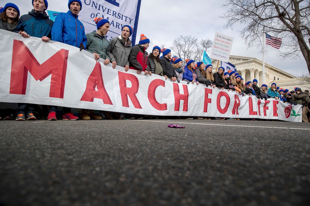 (Andrew Harnik | The Associated Press) Anti-abortion activists march past the Supreme Court in Washington, Friday, Jan. 27, 2017, during the annual March for Life. Thousands of anti-abortion demonstrators gathered in Washington for an annual march to protest the Supreme Court's landmark 1973 decision that declared a constitutional right to abortion.