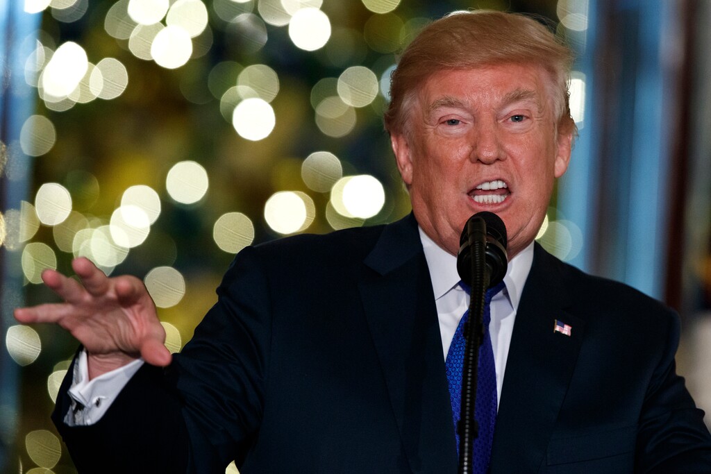 (Evan Vucci | The Associated Press) President Donald Trump speaks on tax reform in the Grand Foyer of the White House, Wednesday, Dec. 13, 2017, in Washington.