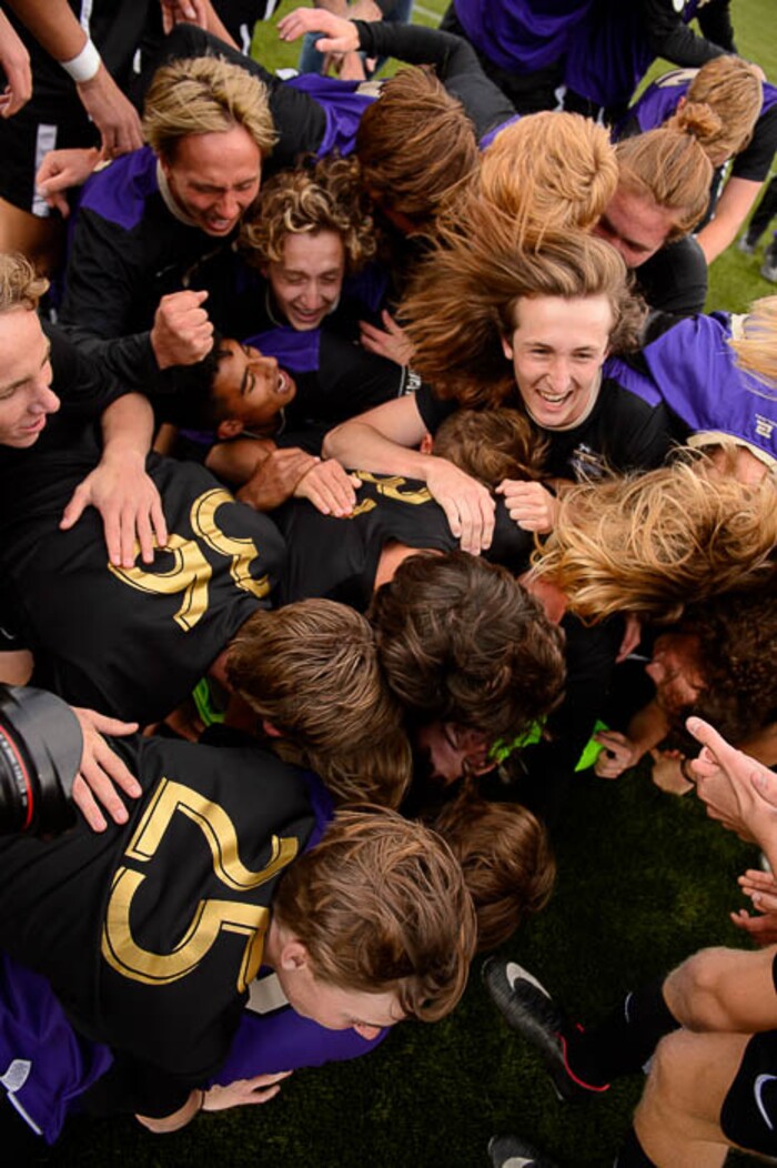 (Trent Nelson | The Salt Lake Tribune)  Desert Hills players celebrate their win over Park City High School in the 4A state championship game, Saturday May 12, 2018.