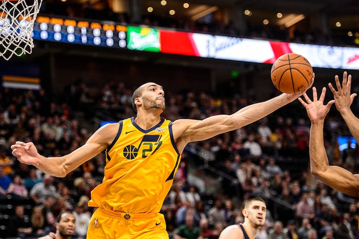 (Trent Nelson | The Salt Lake Tribune)  Utah Jazz center Rudy Gobert (27) pulls in a rebound as the Utah Jazz host the Phoenix Suns, NBA basketball in Salt Lake City, Wednesday Feb. 14, 2018.