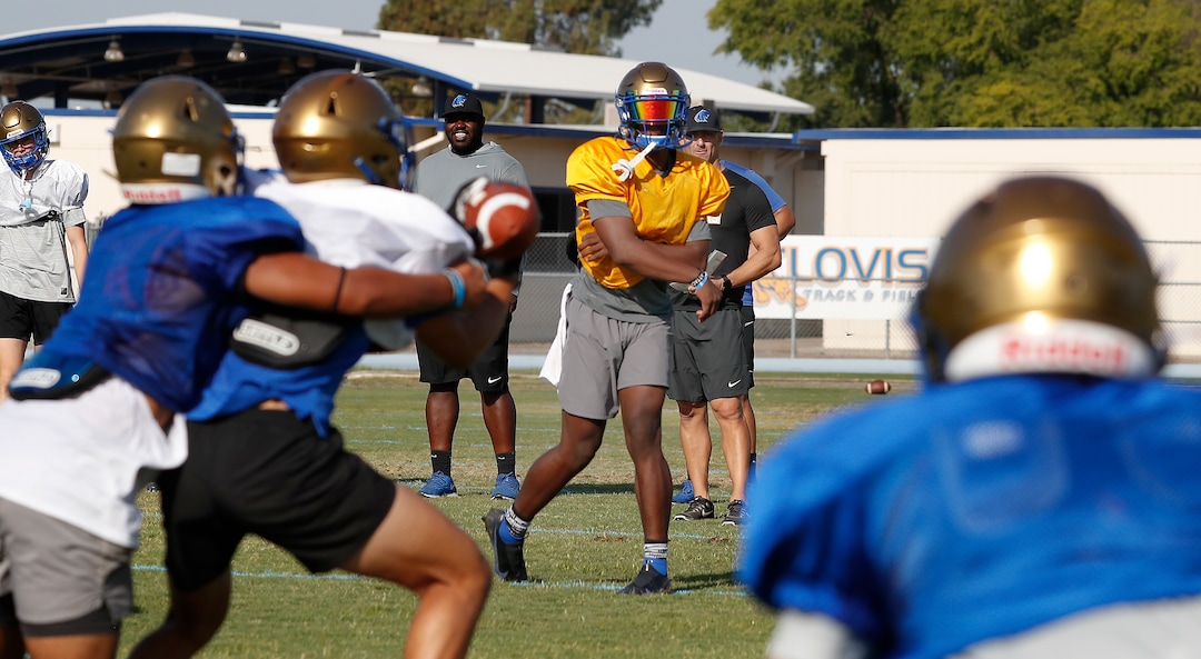 (Gary Kazanjian | Special to The Tribune) Clovis High School quarterback Nate Johnson works out with his team at Clovis High School, who committed to play for the University of Utah, shown Wednesday, July 28, 2021, in Clovis, Calif.