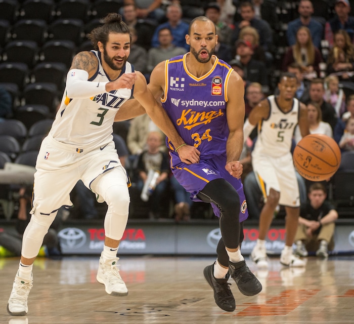 (Rick Egan  |  The Salt Lake Tribune) Utah Jazz guard Ricky Rubio (3) goes for a loose ball along with Sydney Kings guard Perry Ellis (34), in preseason basketball Utah Jazz vs.Sydney Kings, in Salt Lake City, Sunday, October 2, 2017.


