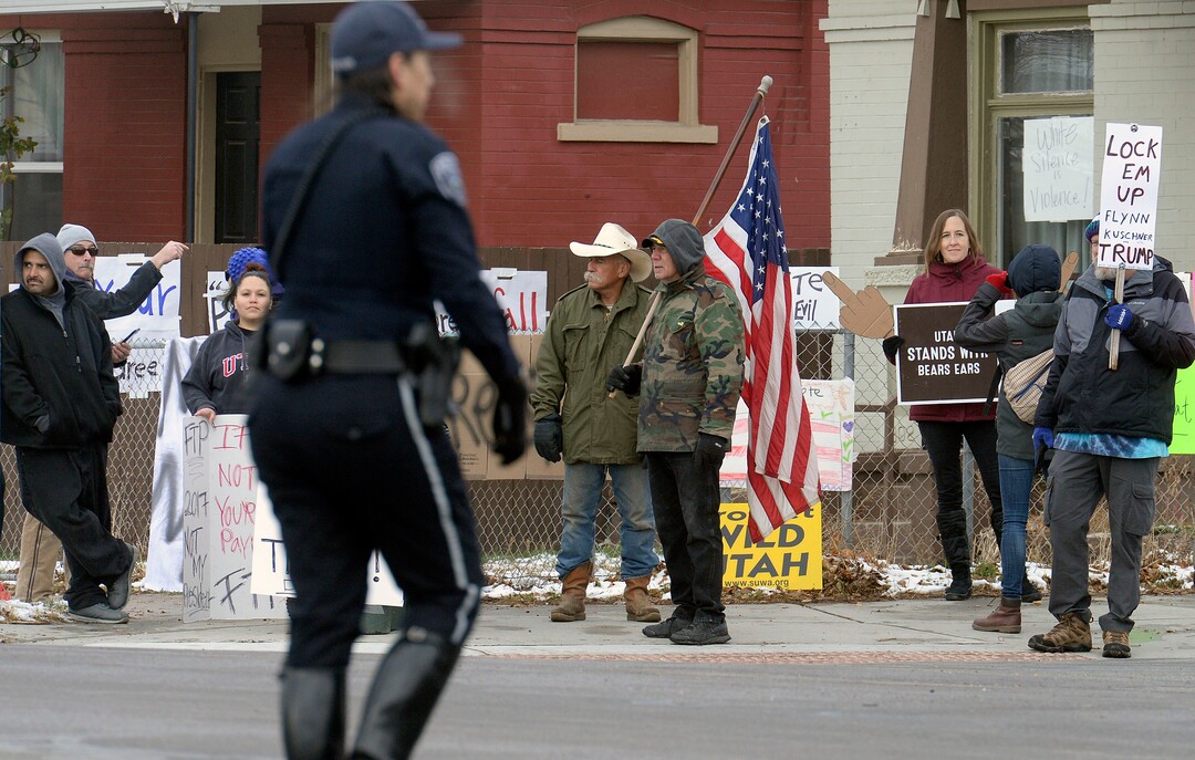 (Al Hartmann  |  The Salt Lake Tribune) 	Crowds protest President Donald Trump outside LDS Welfare Square at 700 S. 800 W. as he tours the facility with church leaders Monday Dec 4. 