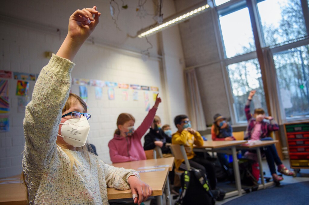 (Gregor Fischer | dpa via AP)

Pupils attend a lesson at an elementary school in Kiel, northern Germany, Feb. 22, 2021.