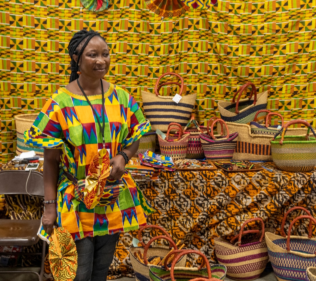 (Rick Egan | The Salt Lake Tribune) Patience Bewe sells baskets made by women in Ghana, at the14th annual Craft Lake City DIY FEST, at the Fair Park, Aug. 13, 2022.