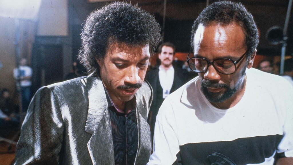 (Netflix) Lionel Richie, left, and Quincy Jones confer during the 1985 recording of "We Are the World," a moment captured in director Bao Nguyen's documentary "The Greatest Night in Pop," an official selection of the Special Screenings section of the 2024 Sundance Film Festival.