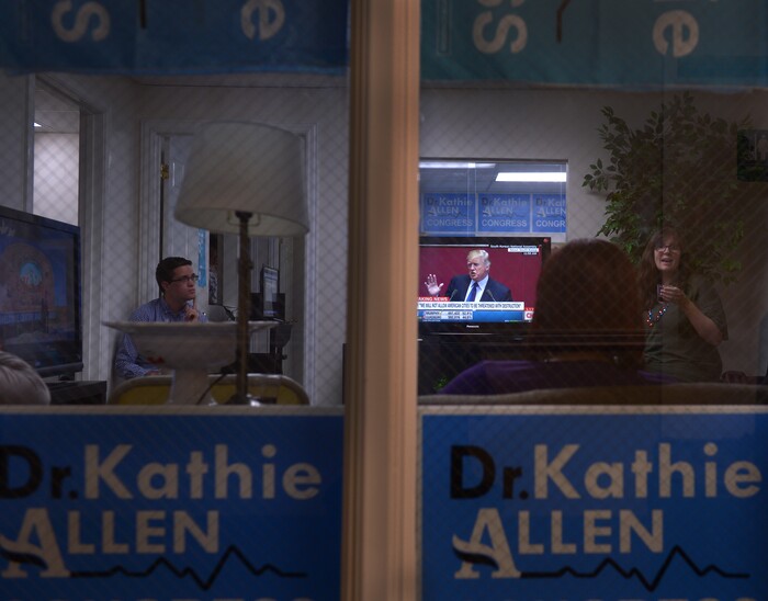 (Leah Hogsten  |  The Salt Lake Tribune) President Donald Trump delivers his speech to the South Korean National Assembly as election staff await the arrival of  Utah's 3rd Congressional District Democratic candidate Kathie Allen at Allen's election night party headquarters in Holladay.  Allen faced faced Republican Provo Mayor John Curtis and the new United Utah Party's Jim Bennett, as well as a handful of independent and third-party candidates in Tuesday, Nov. 7 special election after former Rep. Jason Chaffetz vacated the seat.