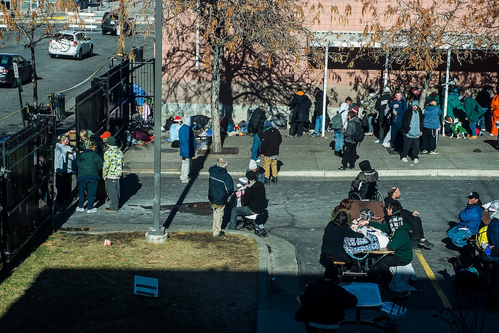 Chris Detrick | The Salt Lake Tribune
Homeless men and women congregate outside the Bishop Weigand Homeless Day Center Tuesday December 23, 2014.