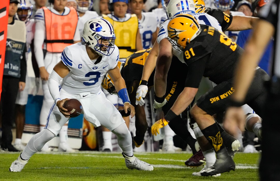 (Francisco Kjolseth | The Salt Lake Tribune) Brigham Young Cougars quarterback Jaren Hall (3) is cornered in football action between the Brigham Young Cougars and the Arizona State Sun Devils at LaVell Edwards Stadium in Provo, on Saturday, Sept. 18, 2021.