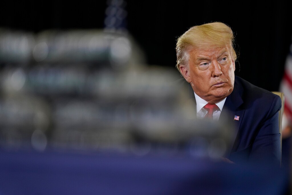 (Evan Vucci | AP file photo)  President Donald Trump listens during a briefing at U.S. Southern Command, Friday, July 10, 2020, in Doral, Fla.