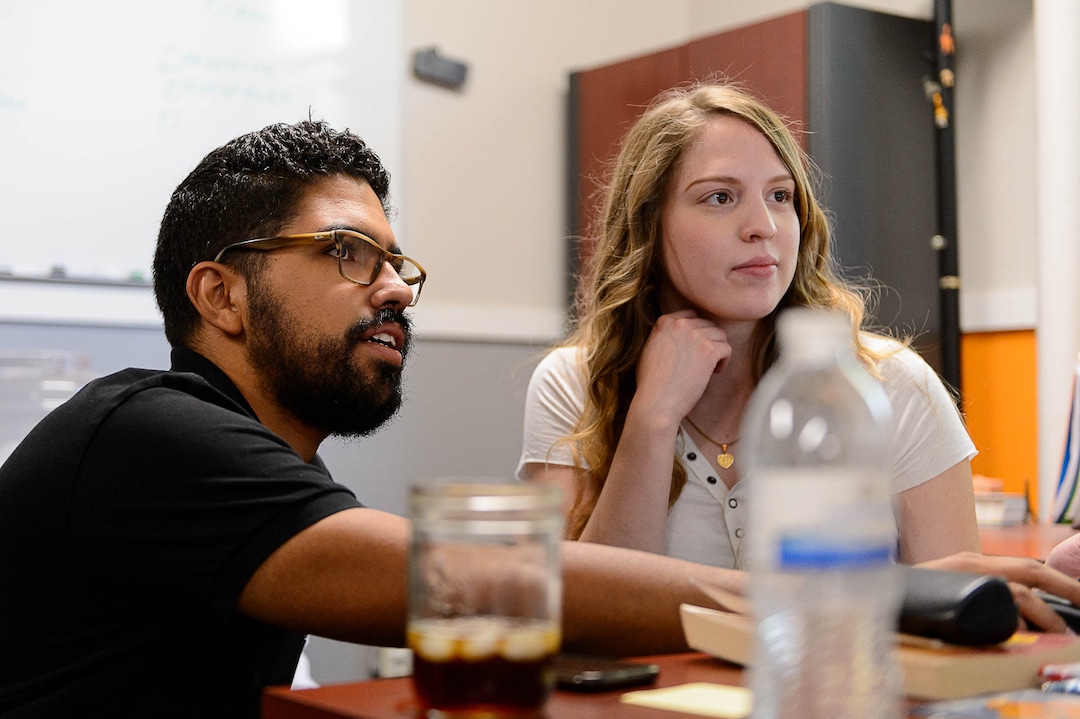 (Trent Nelson  |  The Salt Lake Tribune)  Alonso R. Reyna Rivarola works with a student at the University of Utah's new Dream Center, Friday August 18, 2017. Rivarola is a recipient of DACA who works at the University of Utah as the Dream Program coordinator in the Office of Engagement. He works to support undocumented students (with and without DACA) during their educational journey.