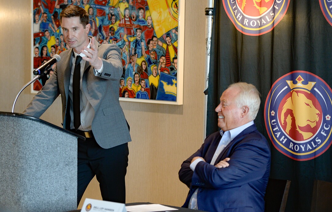 (Francisco Kjolseth  |  The Salt Lake Tribune) The Utah Royals FC announce former Chicago Red Stars assistant Craig Harrington as its new head coach, left, as he acknowledges his family alongside Royals owner Dell Loy Hansen, during a press event at Rio Tinto Stadium in Sandy, Utah on Friday, Feb. 7, 2020.