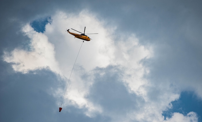 (Francisco Kjolseth  |  The Salt Lake Tribune) Air crews battle a fire in Neffs Canyon on the north side of Mount Olympus on Tuesday, Sept, 22, 2020.