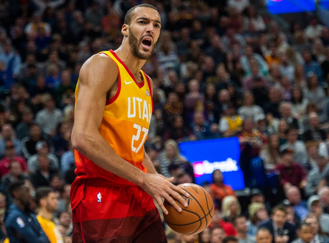 (Rick Egan  |  The Salt Lake Tribune)  Utah Jazz center Rudy Gobert (27) has a few works for the referee, in NBA action between Utah Jazz and Golden State Warriors, in Salt Lake City, Wednesday, Dec. 19, 2018.