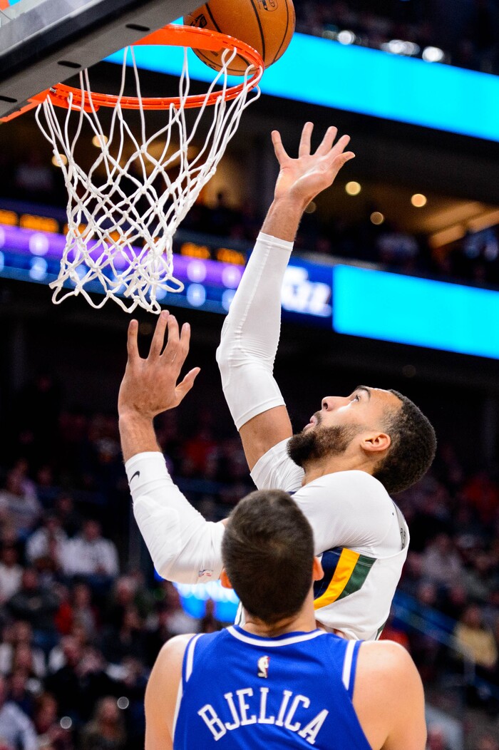 (Trent Nelson  |  The Salt Lake Tribune) Utah Jazz center Rudy Gobert (27) scores over Sacramento Kings forward Nemanja Bjelica (88) as the Utah Jazz host the Sacramento Kings, NBA basketball in Salt Lake City on Saturday, Jan. 18, 2020.
