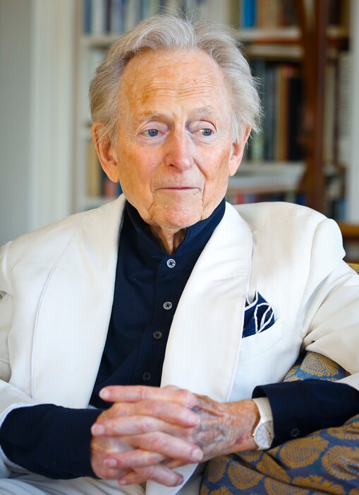 (Bebeto Matthews | The Associated Press) In this July 26, 2016 file photo, American author and journalist Tom Wolfe, Jr. appears in his living room during an interview about his latest book, "The Kingdom of Speech," in New York. Wolfe died at a New York City hospital. He was 88. Additional details were not immediately available.