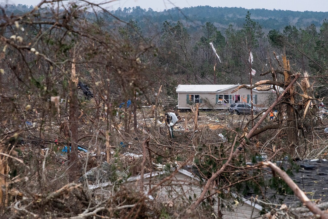 Tornado damage near Beauregard, Ala., on Monday March 4, 2019. Friends in eastern Alabama are helping tornado survivors retrieve the scattered pieces of their lives after devastating winds destroyed their homes and killed at least 23 people. (Mickey Welsh/Montgomery Advertiser via AP)