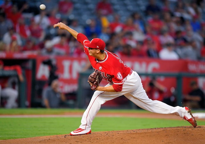 Los Angeles Angels starting pitcher Troy Scribner throws to the plate during the second inning of a baseball game against the Texas Rangers, Thursday, Aug. 24, 2017, in Anaheim, Calif. (AP Photo/Mark J. Terrill)