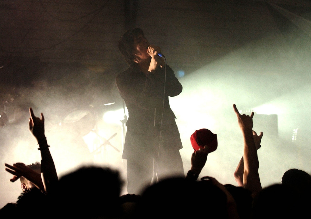 (Rick Egan  |  The Salt Lake Tribune)  The Strokes frontman Julian Casablancas gets the crowd going during a show at In The Venue in Salt Lake City, Monday, April 19, 2004.