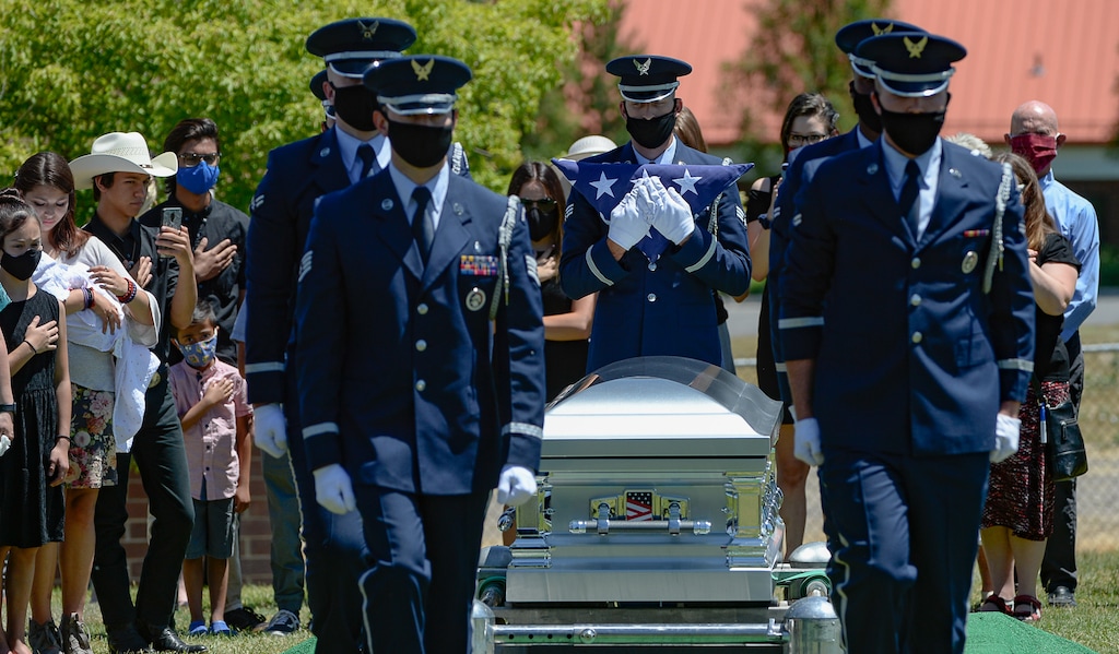 (Francisco Kjolseth  |  The Salt Lake Tribune ) Members of the Hill Air Force Base color guard perform military honors for Dallas Lynn Stevens as he was laid to rest at the Utah Veterans Cemetery in Bluffdale on Wednesday, June 24, 2020.