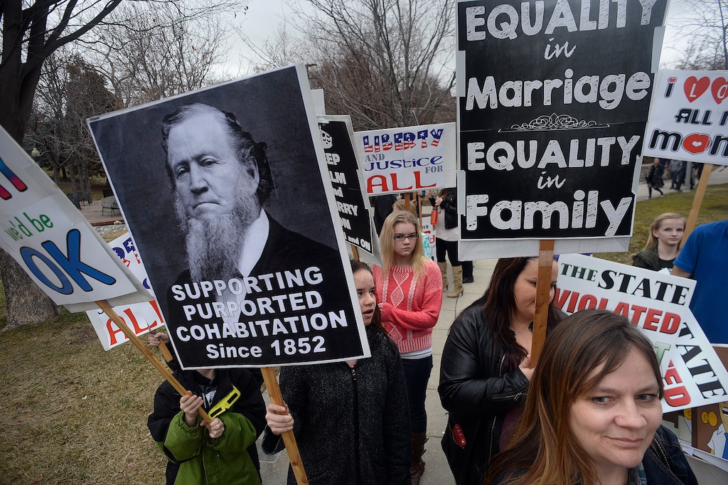 Scott Sommerdorf   |  The Salt Lake Tribune  Polygamists and their supporters assembled at City Creek Park prior to their march to the Capitol where they held a rally, Friday, February 10, 2017. 