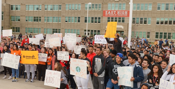 (Leah Hogsten  |  The Salt Lake Tribune) Students at East High School held moments of silence and called for change in the form of registering to vote. Exactly one month after 17 people were killed at Marjory Stoneman Douglas High School in Parkland, survivors of the massacre joined tens of thousands of students across the United States by walking out of school, Wednesday, March 14, 2018. 