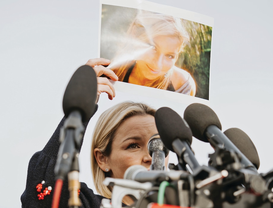 BC-OPINION-WEINER-JEFFREY-EPSTEIN-ART-NYTSF — Danielle Bensky, an Epstein abuse survivor, holds up a photo of her younger self during a news conference with lawmakers on the Epstein Files Transparency Act outside the U.S. Capitol in Washington, on Nov. 18, 2025. (Damon Winter/The New York Times) — ONLY FOR USE WITH ARTICLE SLUGGED — BC-OPINION-WEINER-JEFFREY-EPSTEIN-ART-NYTSF — OTHER USE PROHIBITED.
