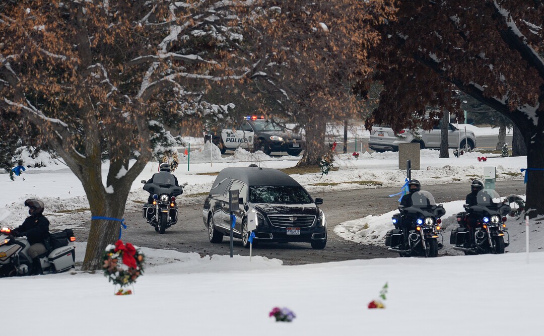 (Francisco Kjolseth  |  The Salt Lake Tribune)  The hearse carrying police officer David Romrell arrives for funeral services at Larkin Sunset Gardens Cemetery in Sandy, Wed. Dec. 5, 2018.