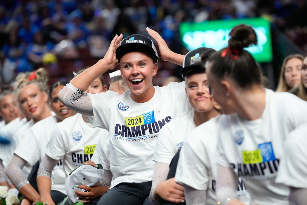 (Francisco Kjolseth  |  The Salt Lake Tribune) Maile O’Keefe celebrates a team win following the Pac-12 championship at the Maverik Center in West Valley City on Saturday, March 23, 2024.