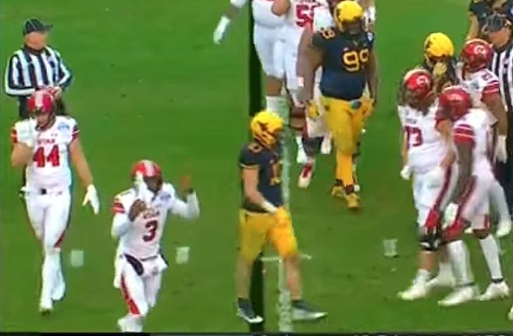 (Scott Sommerdorf   |  The Salt Lake Tribune)   Utah QB Troy Williams, takes off his shoe in order to be forced from the final 1:50 of the bowl game vs West Virginia so freshman QB Drew Lisk could take the game's final snaps in these frames from the ESPN broadcast of the Heart of Dallas Bowl played Tuesday, December 26, 2017. 
