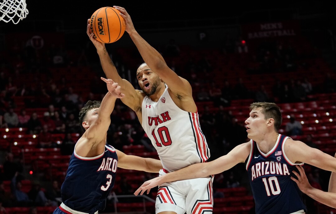 (Francisco Kjolseth | The Salt Lake Tribune) Utah Utes guard Marco Anthony (10) stretches out for a ball as Arizona Wildcats guard Pelle Larsson (3) and Arizona Wildcats forward Azuolas Tubelis (10) defend as the University of Utah hosts the Arizona Wildcats in NCAA basketball in Salt Lake City on Thursday, Dec. 1, 2022.