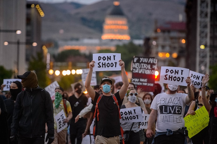 (Trent Nelson  |  The Salt Lake Tribune) Protesters march through Salt Lake City on Monday, June 1, 2020.