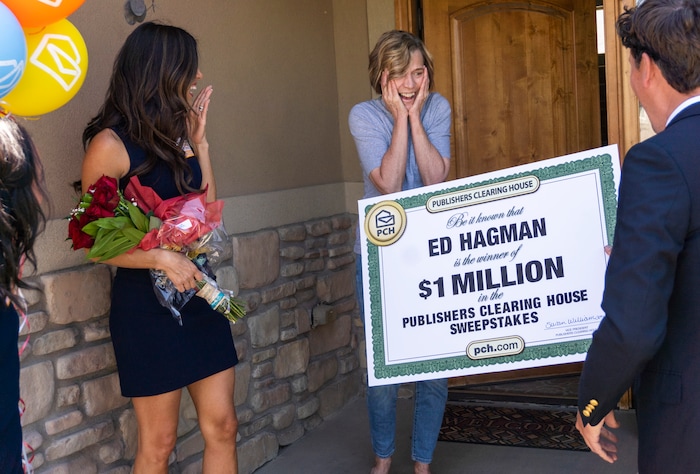 (Rick Egan | The Salt Lake Tribune) Members of the Prize Patrol from Publishers Clearing House, from left,  Bianca Quinnonez, Danielle Lam and  Howie Guja surprise Denise Hagman (center) with the news that she and her husband won $1,000,000, at her home in Herriman, on Friday, May 28th