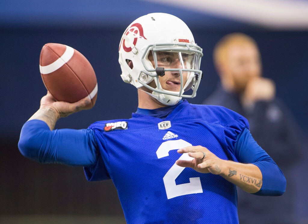 FILE - In this July 23, 2018, file phtoo, Montreal Alouettes quarterback Johnny Manziel throws during practice in Montreal. The Alouettes announced that Manziel will be their starter Friday night, Aug. 3, 2018, when they host the Hamilton Tiger-Cats. The 2012 Heisman Trophy winner began the season with Hamilton and was dealt to Montreal on July 22 in a five-player deal that also included two first-round draft picks. (Ryan Remiorz/The Canadian Press via AP, File)