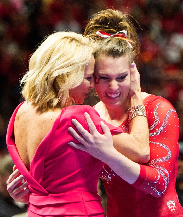 Rick Egan  |  The Salt Lake TribuneBarely Rowe gets a hug from coach Megan Marsden after her performance on the bean for the Utes, in gymnastics action, Utah vs UCLA, at the Huntsman Center, Saturday, February 18, 2017.