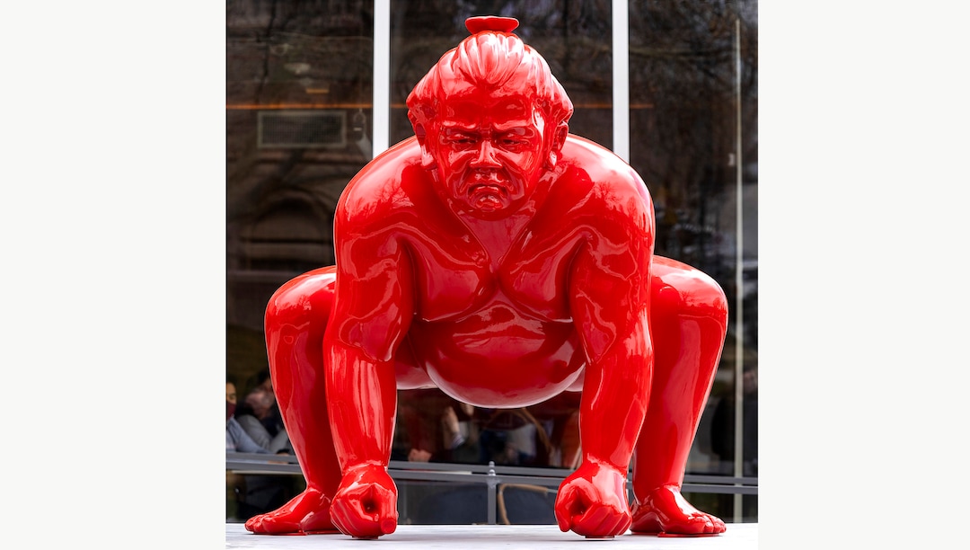 (Rick Egan | The Salt Lake Tribune)  A new art installation of a life-size sumo wrestler, in front of the Mountain West Commercial Real Estate building, previously the KALL Radio 910 broadcast station, on South Temple, in Salt Lake City, on Monday, March 29, 2021