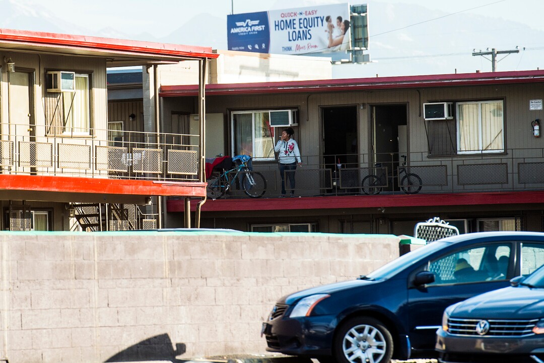 (Chris Detrick  |  The Salt Lake Tribune)  A woman smokes a cigarette at the Gateway Inn 819 West North Temple in Salt Lake City Tuesday, October 17, 2017. 