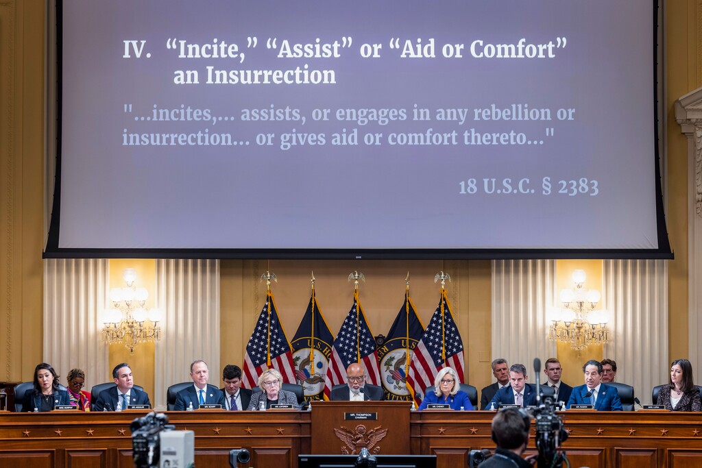 (Jim Lo Scalzo | Pool) An image with information about the criminal referral of former President Donald Trump to the Department of Justice is displayed as the House select committee investigating the Jan. 6 attack on the U.S. Capitol holds its final meeting on Capitol Hill in Washington, Monday, Dec. 19, 2022.