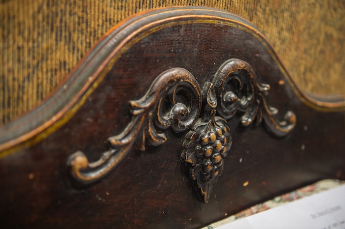 (Rachel Molenda  |  The Salt Lake Tribune)  A detail of a pioneer era bishop's couch at Anthony's Fine Art in Salt Lake City, on Thursday, July 19, 2018. The shop has a collection of early pioneer art and furniture on display.