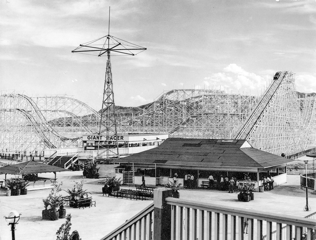 (Utah State Historical Society) A photograph of the Giant Racer rollercoaster and pavilion at Saltair II.
