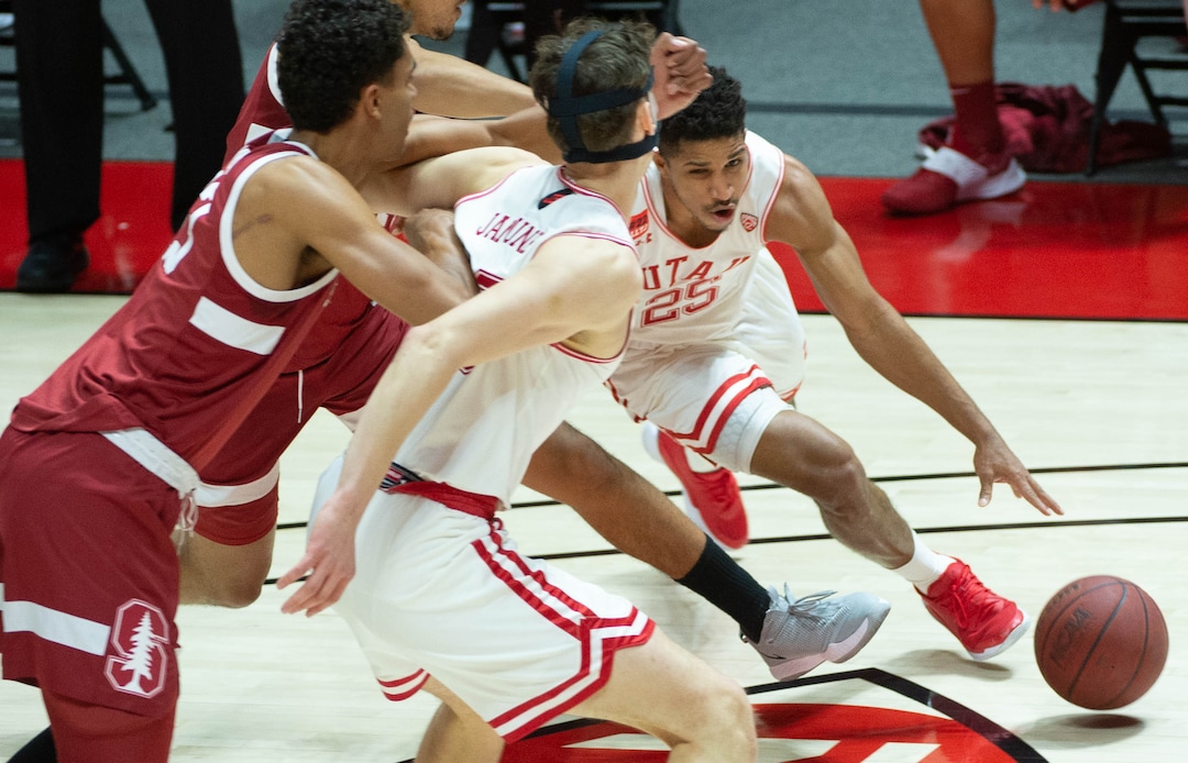 (Francisco Kjolseth  | The Salt Lake Tribune) Utah Utes guard Alfonso Plummer (25) pushes past the defense as the Utes host the Stanford Cardinals on Thursday, Jan. 14, 2021 at the Jon M. Huntsman Center in Salt Lake City.