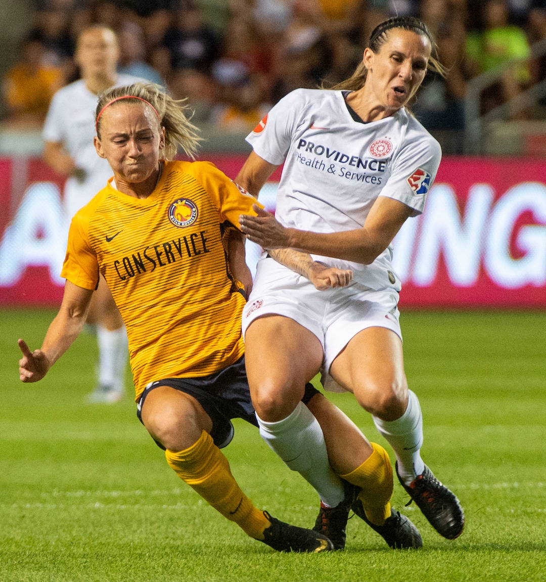 (Rick Egan  |  The Salt Lake Tribune)    Utah Royals FC midfielder Gunnhildur Jónsdóttir (66) collides with Portland Thorns FC defender Katherine Reynolds (2), in Soccer action between Utah Royals FC and Portland Thorns FC, in Sandy, Friday, July 19, 2019.