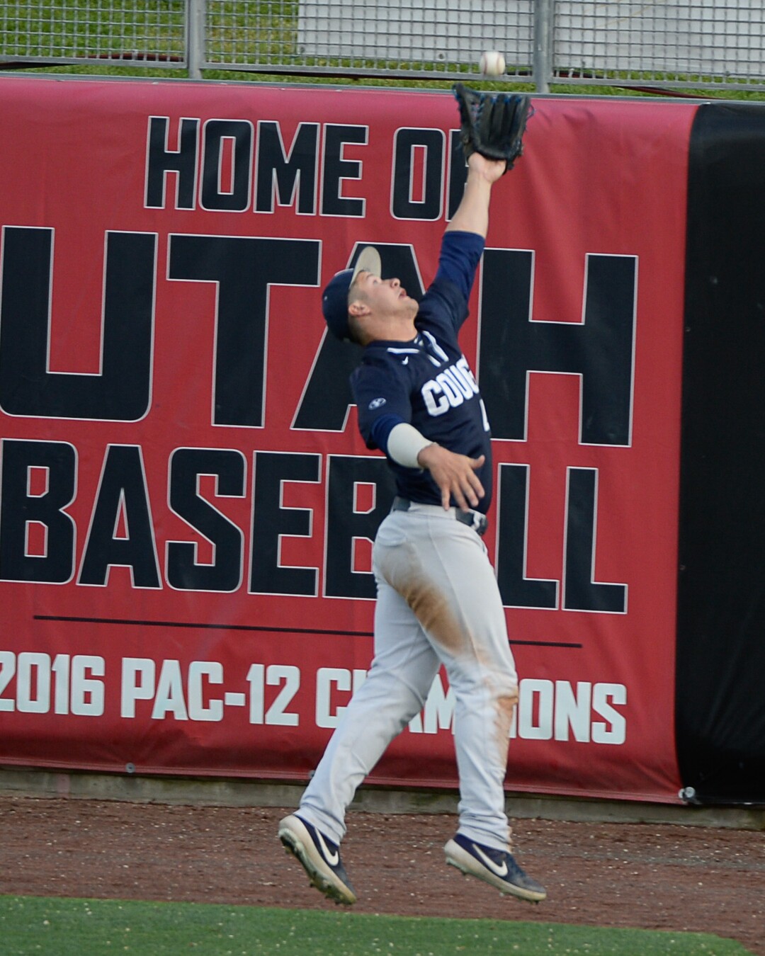 (Francisco Kjolseth  |  The Salt Lake Tribune)  BYU's Brock Hale stretches out for a ball at the far end of the first base line as Utah and BYU renew their rivalry on the baseball diamond as they battle it out at Smith's Ballpark in Salt Lake City on Tuesday, May 14, 2019.