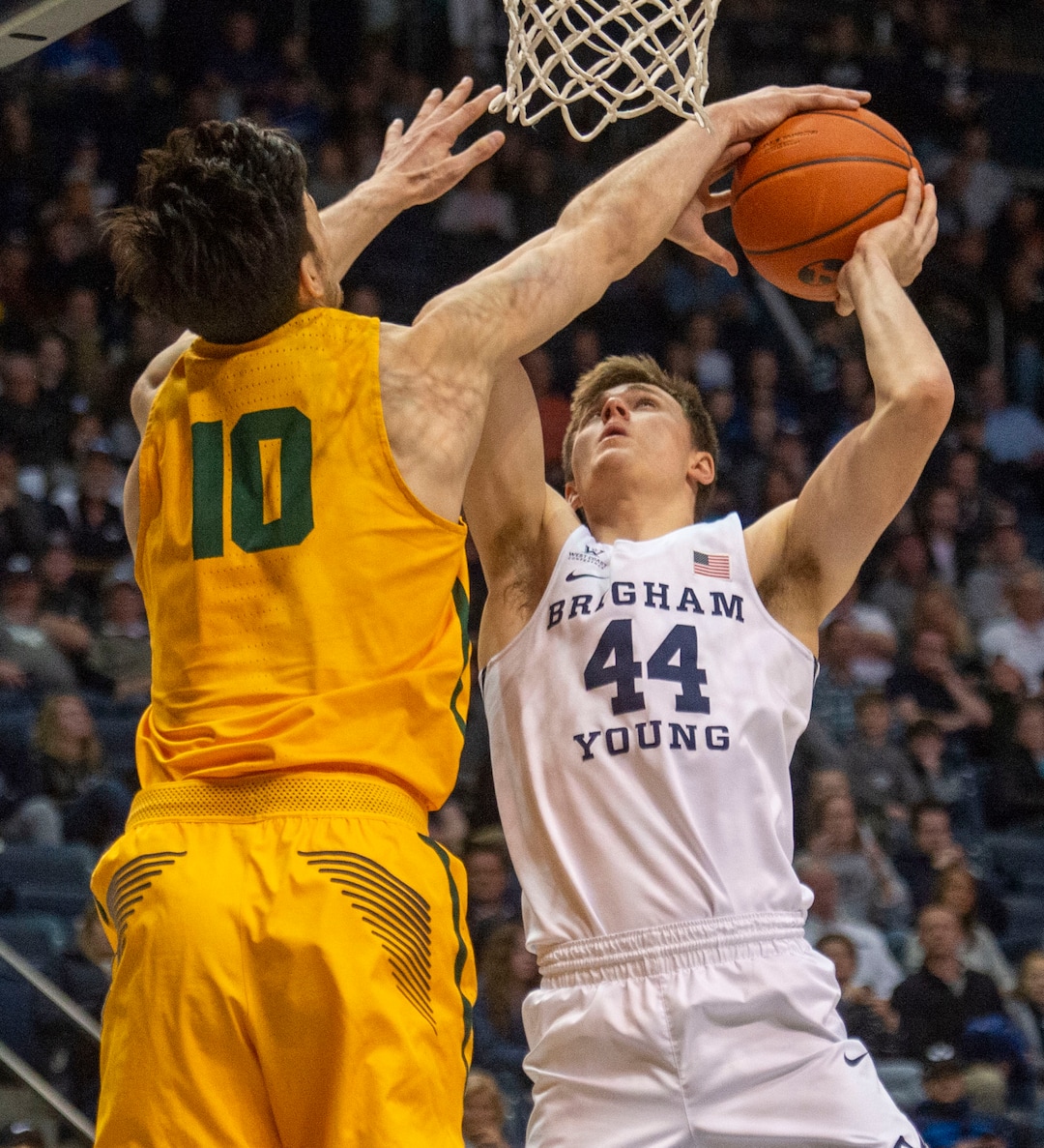 (Rick Egan  |  The Salt Lake Tribune)      San Francisco Dons forward Matt McCarthy (10)  blocks a shot by Brigham Young Cougars guard Connor Harding (44), in WCC basketball action between Brigham Young Cougars and San Francisco Dons, at the Marriott  Center, Thursday, February 21, 2018.